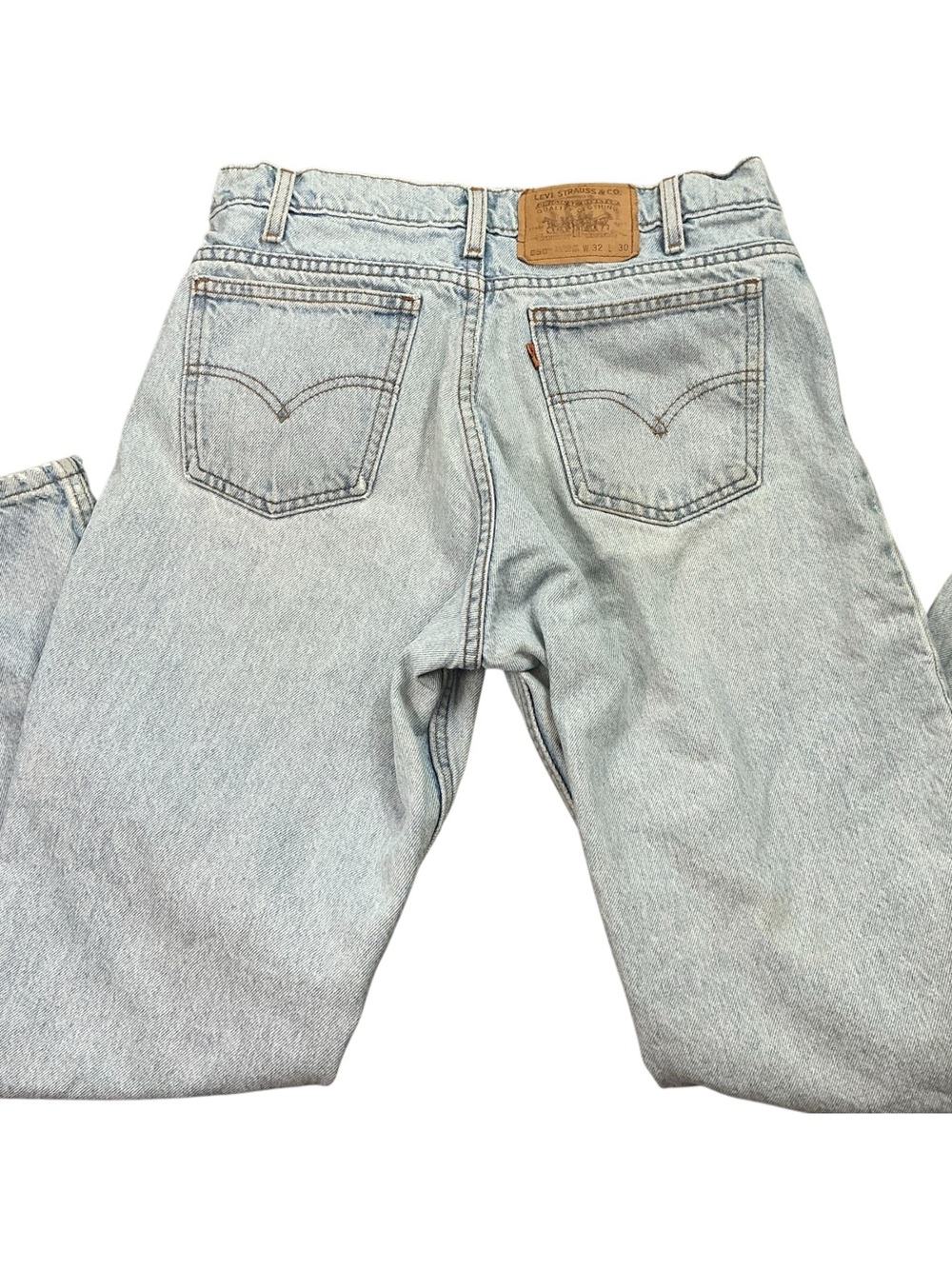 Vintage Levi’s orange tab 550 light wash 90s relaxed fit jeans 30 x 28